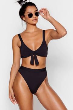 Boohoo ad — Shop Nasty Gal's bold black bikini look